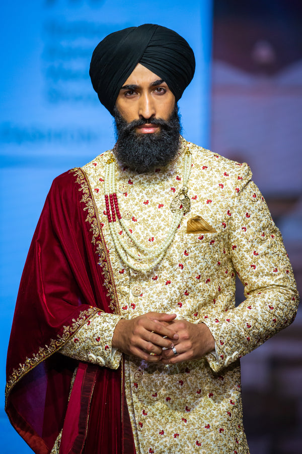 GOLD SHERWANI WITH MAROON TOUCHING